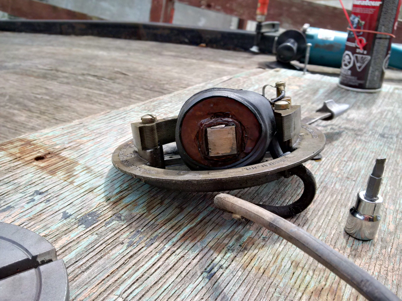 Don’t know quite what to make of this. This original coils were brown like this, the later ones were black and pretty unreliable. It’s either original and very clean, or the last guy to pull it apart went to the trouble of finding a good coil.